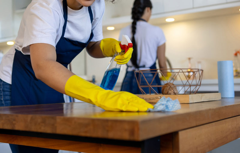 cleaning service cleaning a kitchen